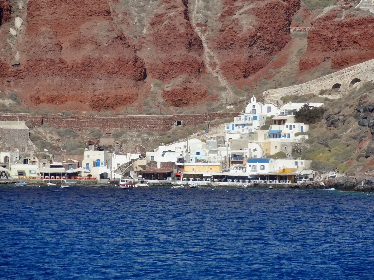 The tavernas and boat landing of Ammoudi Bay below Oia, a port for Santorini catamaran cruises